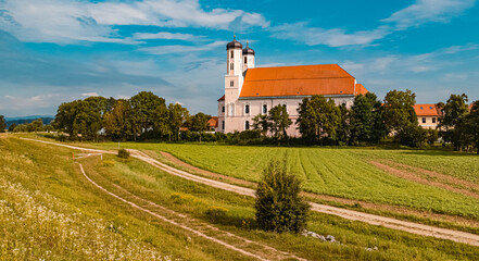 Fototapeta na wymiar Beautiful monastery on a sunny day at Oberalteich, Bavaria, Germany