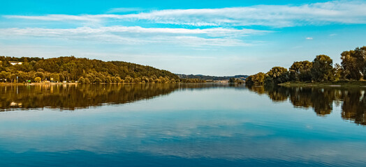 Beautiful summer view with reflections near Mettenufer, Danube, Bavaria, Germany