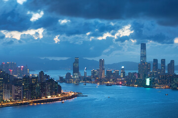 Fototapeta na wymiar Victoria harbor of Hong Kong city at dusk