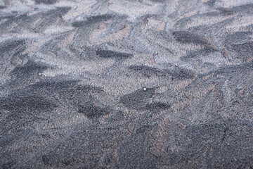 frozen water on glass turned into patterns and beauty