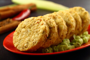 Uncooked  meat cutlets, for deep frying in oil.