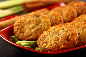 Oven fresh crispy baked meat  cutlets -Asian cuisines background.