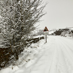 Heavy snow covers single tracked rural lane after daylong snowfall in Nidderdale