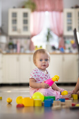 Baby one year old plays