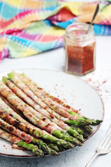Seasonal fresh asparagus fried with bacon