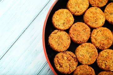 Homemade traditional recipes- meat cutlets served in a ceramic plate on a rustic wooden table, 