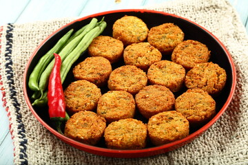 Indian street foods background, delicious and spicy cutlets . healthy snack foods background.
