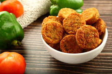 Homemade delicious chicken cutlets served in ceramic bowl. healthy snack foods background. 