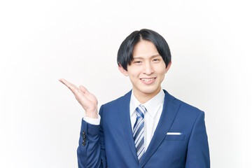 案内するビジネスマン