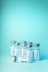 Coronavirus vaccine background. Covid-19 coronavirus vaccination with vaccine bottle for covid 19...