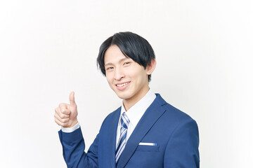 グッドサインするビジネスマン