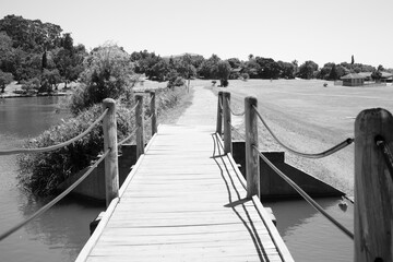 Obraz premium Wooden bridge by the PARK