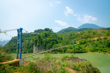 Fototapeta na wymiar a suspension bridge named Nam Cut Bridge in Tua Chua district, Dien Bien province, Vietnam