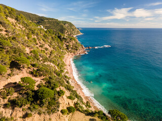 Fototapeta na wymiar Tossa de mar girona europe spain beach turquoise blue water without people costa brava
