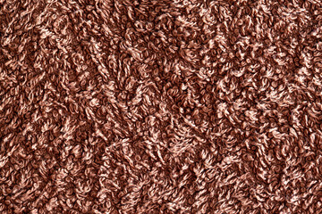 Brown terry cloth, backdrop. Terry towel texture, macro