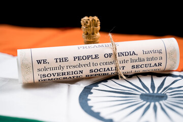 Indian constitution or Bharatiya Savidhana preamble with we the people of India writings paper...