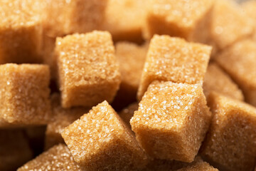 Pieces of brown sugar close-up macro, top view