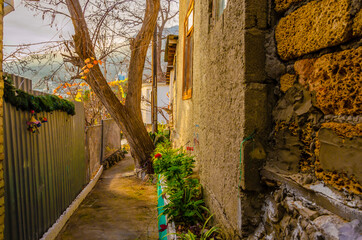 An old narrow street in a seaside town.