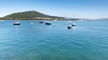 Panorama of blue sea, sky and yachts