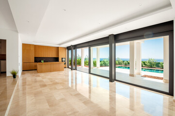 Modern kitchen with island in browns.
