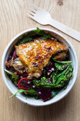 Healthy salad with glazed chicken tigh