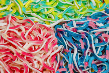 Multicolored jelly snake background, three kinds