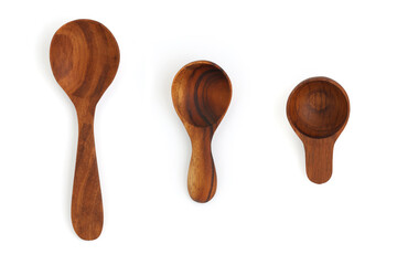 Close up top view wooden spoon set on white background isolated