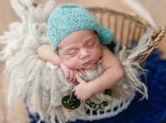 Charming newborn baby boy sleeping