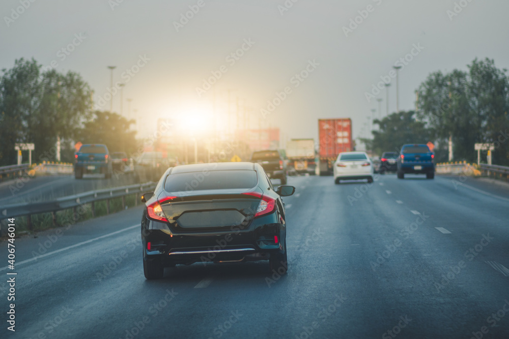 Wall mural car on road and small passenger car seat on the road used for daily trips