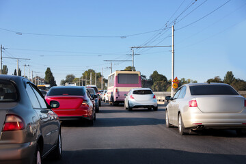 Fototapeta na wymiar Cars in traffic jam on city street