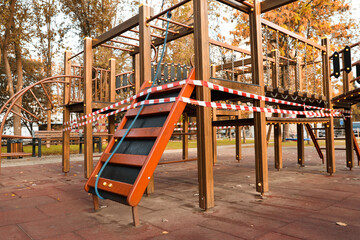 Fototapeta na wymiar Empty children's playground closed during COVID-19 quarantine