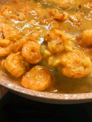 delicious dish of shrimp in sauce. food photo