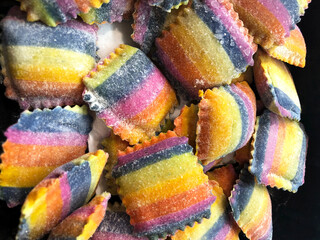 colored rainbow frozen ravioli. food photo