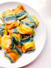 colored rainbow ravioli. food photo