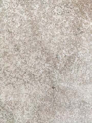 the structure of an old white concrete wall