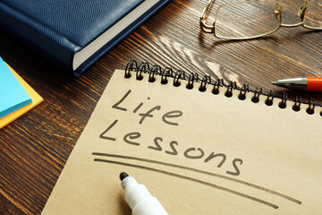 Life lessons handwritten on the page and glasses.