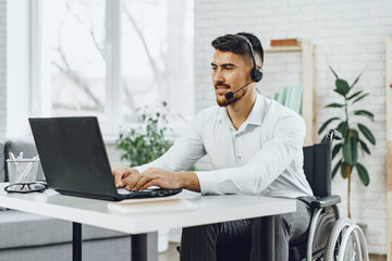 Disabled young man businessman working from home