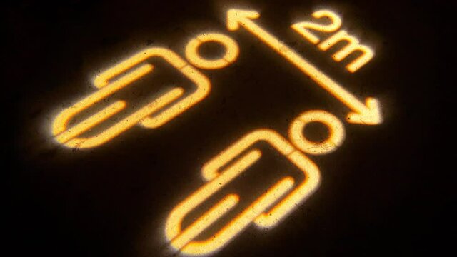 Social distancing 2m apart logo illuminated floor sign England Covid-19