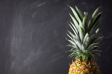 food composition, pineapple isolated on black background with space for text