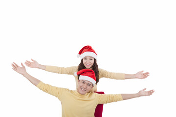 Portrait of young woman wearing santa hats,smiling