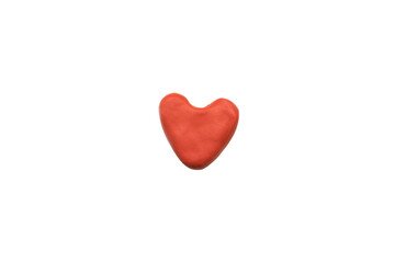 Red plasticine heart on isolated white background