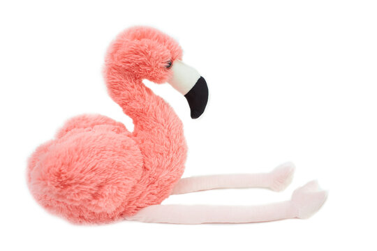 Isolated soft toy pink flamingo of cloth.