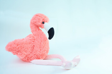 Isolated soft toy pink flamingo of cloth. © Irene Fox