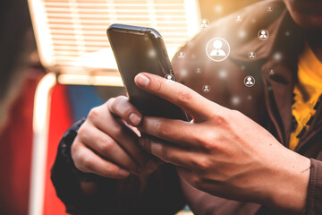 Social Networking: Businessman Using Smartphone to Play Social Media, Media, and Marketing Concept