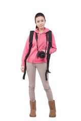 Fototapeta premium Portrait of young female carrying backpacker holding camera