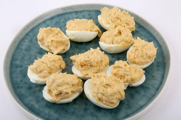 stuffed eggs with tuna and mayonaisse sauce as snack food