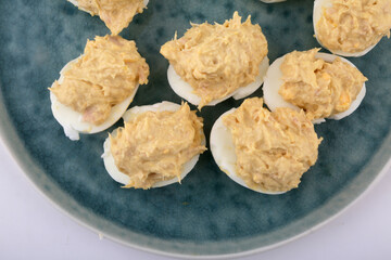stuffed eggs with tuna and mayonaisse sauce as snack food