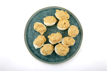 stuffed eggs with tuna and mayonaisse sauce as snack food