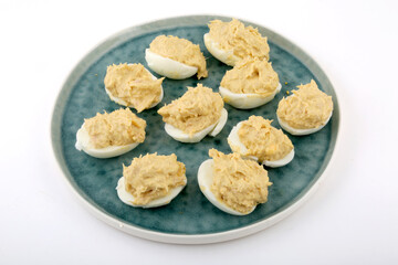 stuffed eggs with tuna and mayonaisse sauce as snack food