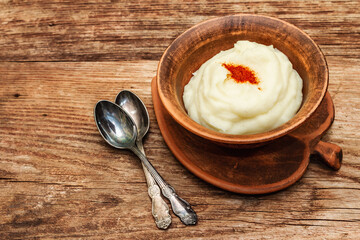 Mashed potato in antique ceramic bowl